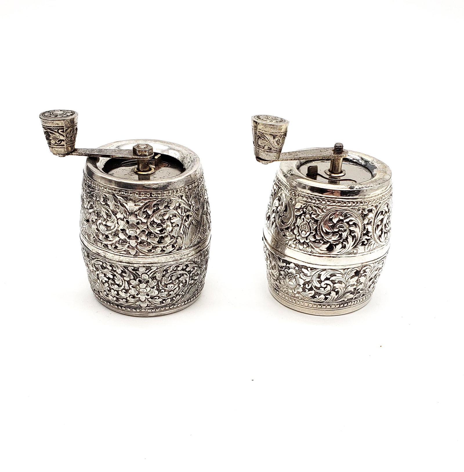 Vintage Two .800 Silver Pepper Grinders Italy!: Vintage two Silver different patterns France barrel pepper Grinders, made in France by Marlux 3" tall, one is stamped .800 the other one not, please note the silver skin was removed off of one piece,