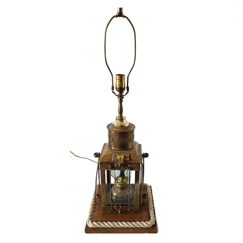 Vintage Great Britain 1939 Out Lamp!: Vintage Original Great Britain Cargo light lantern 1939. Brass oil lamp converted to a modern table lamp, added new sockets and wiring, uses one standard bulb and one candelabra bulb, lamp set on a wo