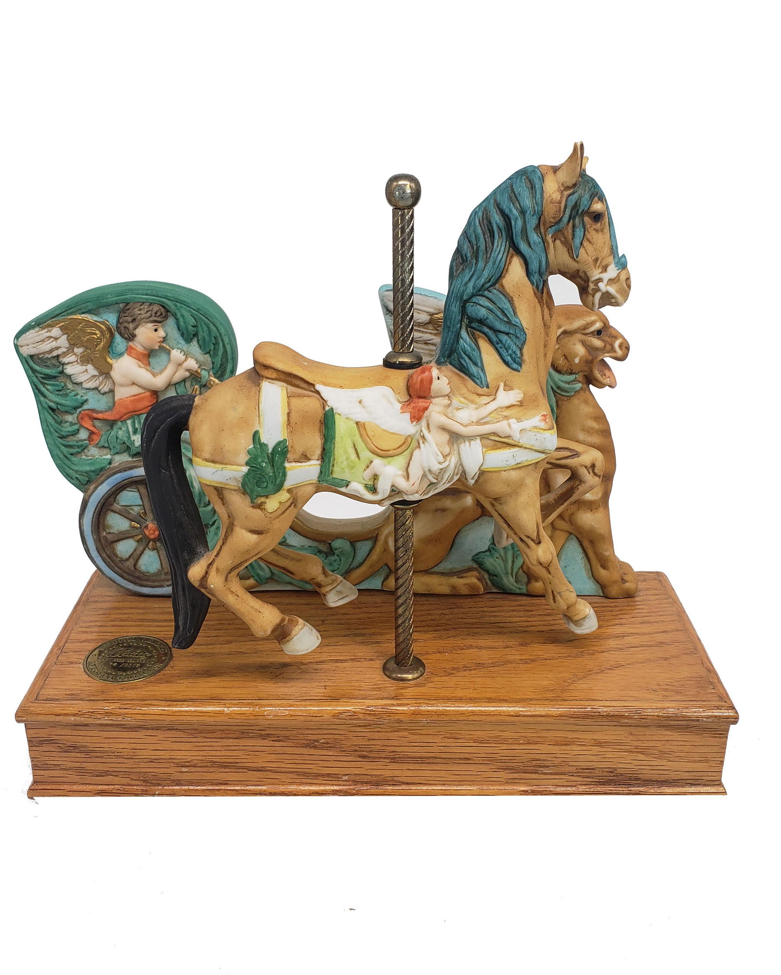 Vintage Collectible Musical Carousel Waltz: Vintage Collectible music box, Carousel waltz, colorful horse against sea serpent background on wooden box, made by Willitis Canada limited edition no. 74/9500,measures 8 H X 9 L 3.5 W, works well in 