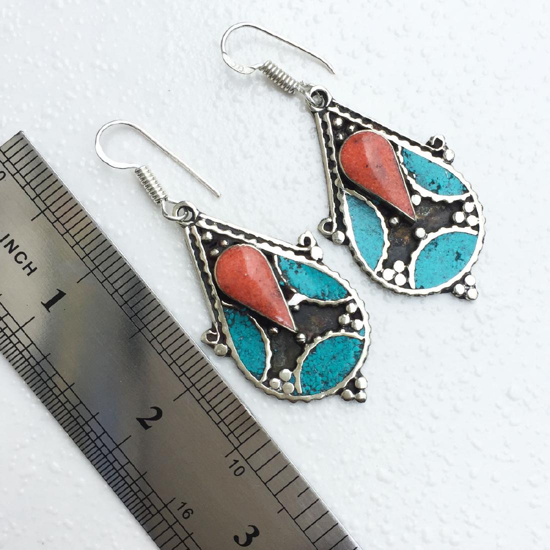 Ethnic Turquoise & Coral Choker Handmade Earrings: Tibetan Handmade Ethnic Earrings Main Stone: Turquoise, Coral & Lapis Metal: Tibetan Silver Weight: 12 Gram Approx Material: Stone Brand: Handmade Style: Bohemian Ethnic Origin: Tibetan Country/Region