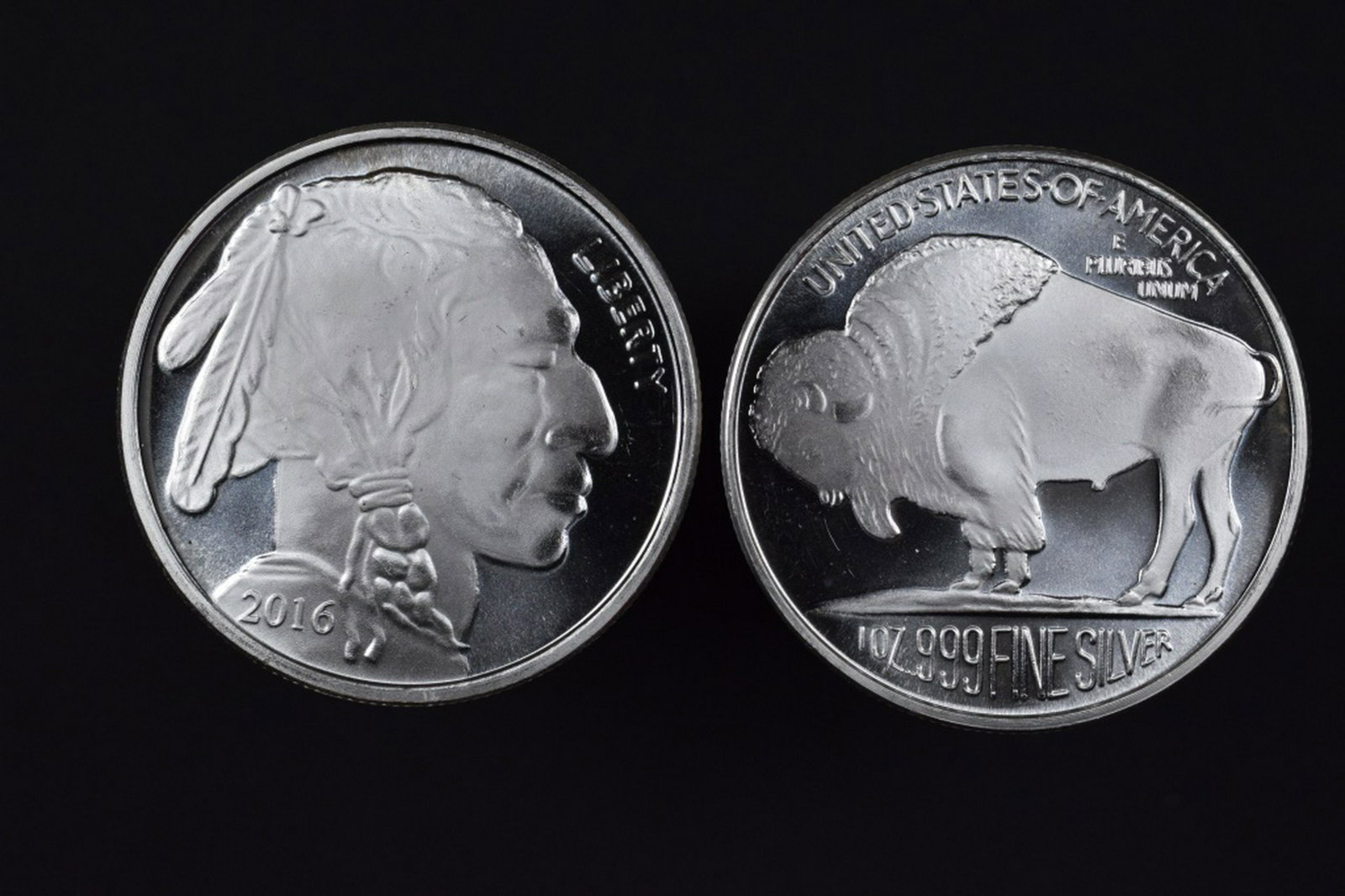 2016 Buffalo 1 ozt silver rounds (2): A pair of 2016 Buffalo/Native American 1 troy ounce silver bullion rounds.