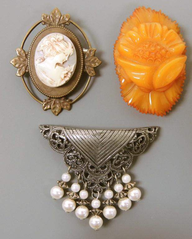 2 Brooches & Bakelite Clip: Cameo and Antique Silver Color with pearl-like bead brooches. Bakelite clip - May be shoe clip.
