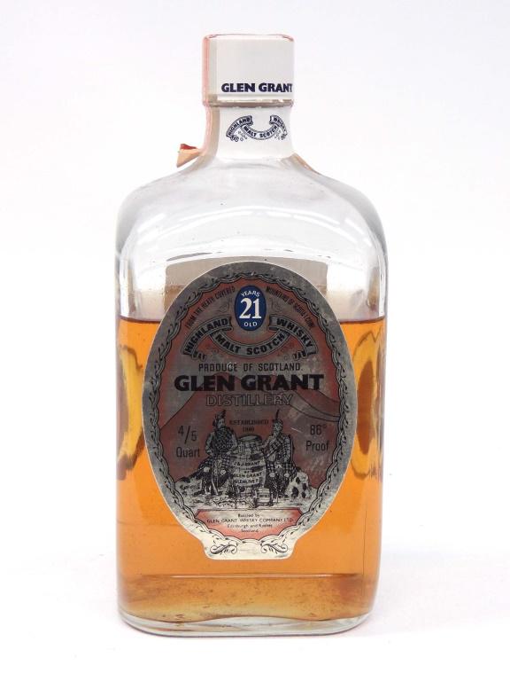 Glen Grant Sealed Bottle 21 year old Highland Whiskey.: 21 year old Highland Whiskey. 4/5 qt. Low fill. Appears Sealed. If you need shipping, talk to Ian before bidding.