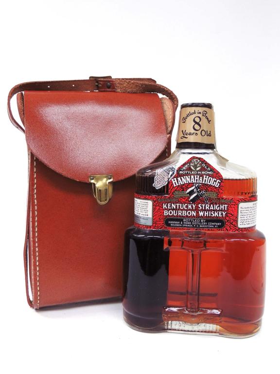 Hannah & Hogg 8-Year Bottled In Bond Whiskey: Hannah & Hogg 8-Year Bottled In Bond Kentucky Whiskey, Binocular Bottle - with Leather Case & Strap, in new condition. **If you will need bottles shipped, please speak with Ian before bidding**