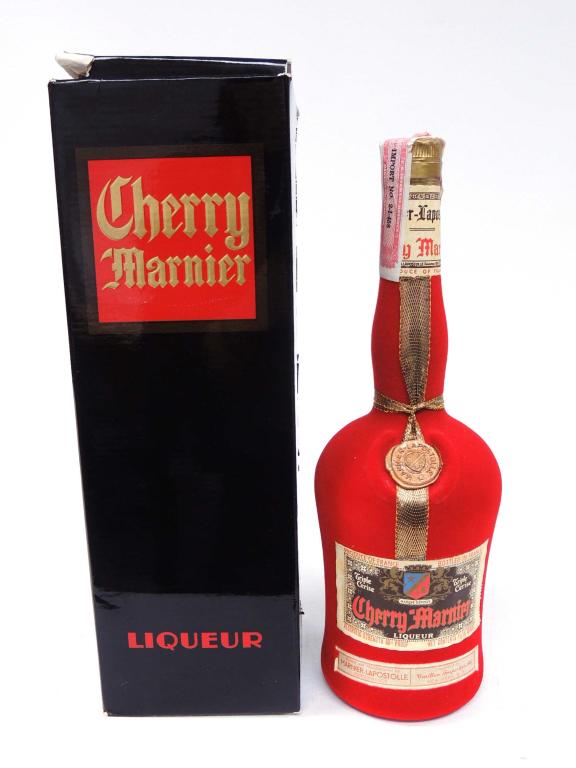 Cherry Marnier Liqueur: 11/16 Quarts. Please talk to Ian before bidding on bottles, if you may need shipping.