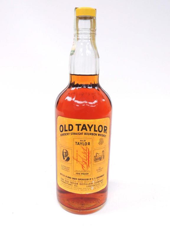 Old Taylor Whiskey Bottle: 1966-70. 4-Year. 100 Proof. Bottled in Bond. No sticker on back. Please talk to Ian before bidding on bottles, if you may need shipping.