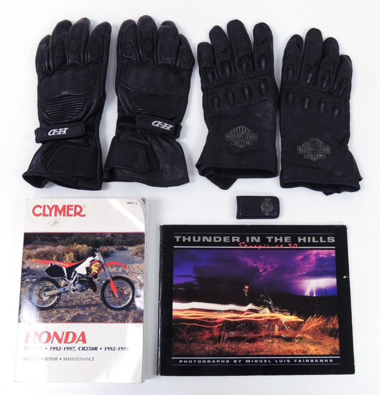 Motorcycle Lot - Harley Davidson +: Includes 2 pairs of Harley Davidson leather gloves, Harley Davidson leather magnetic money clip, Thunder in the HIlls Harley Davidson book, Clymer Honda CR1Z5R owners manual, & 3 motorcycle t-shirts
