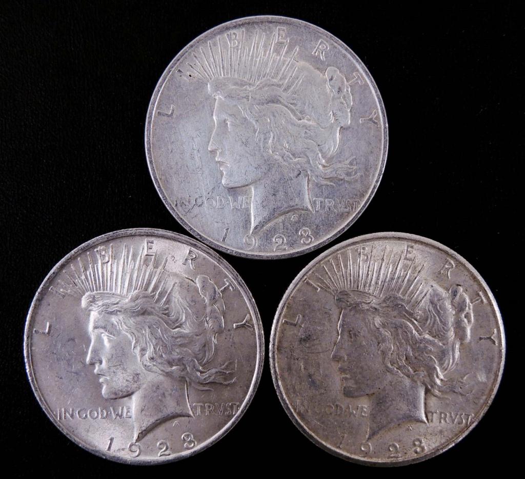 Peace silver dollars (3) (1 of 2)