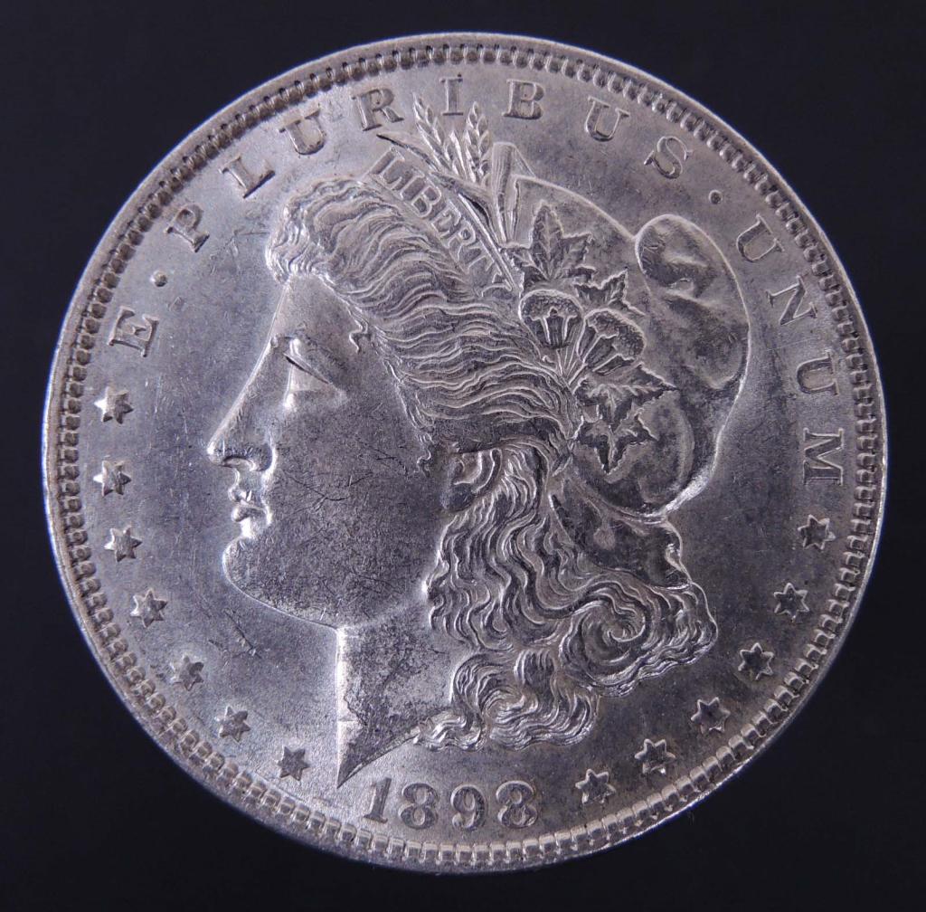 1898 Morgan silver dollar (BU?) (1 of 2)