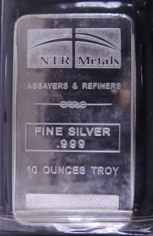 10 ozt. NTR Metals Assayers & Refiners Silver Bar: 10 troy ounce bar of 0.999 fine silver from NTR Metals Assayers & Refiners.