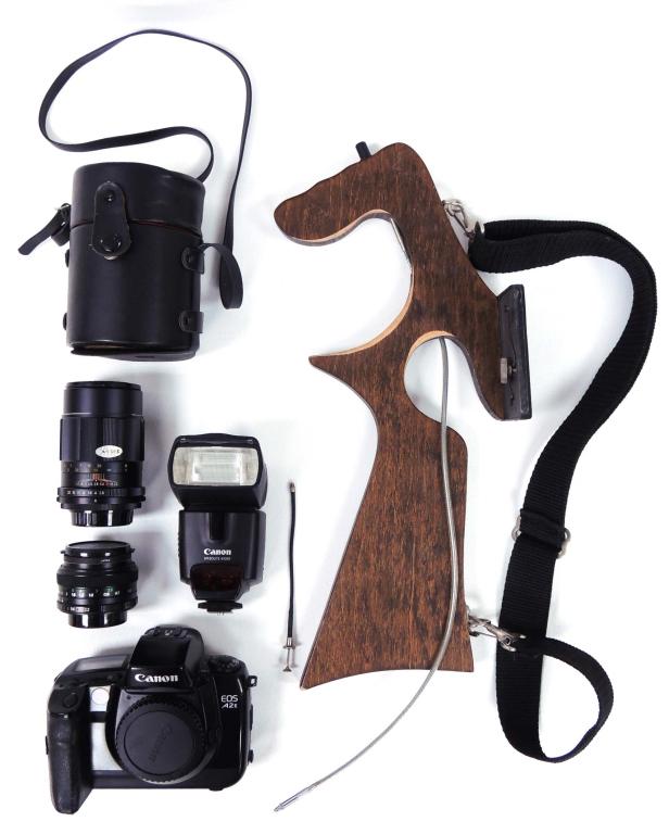 Photography/Camera Lot: Canon EOS A2E 35mm Camera; Fuji Lens 55mm 1:2.2; Canon Speedlite 430 EX Flash; Sears 134 mm lens 1:2.8 in, carrying case; rifle butt camera mount.