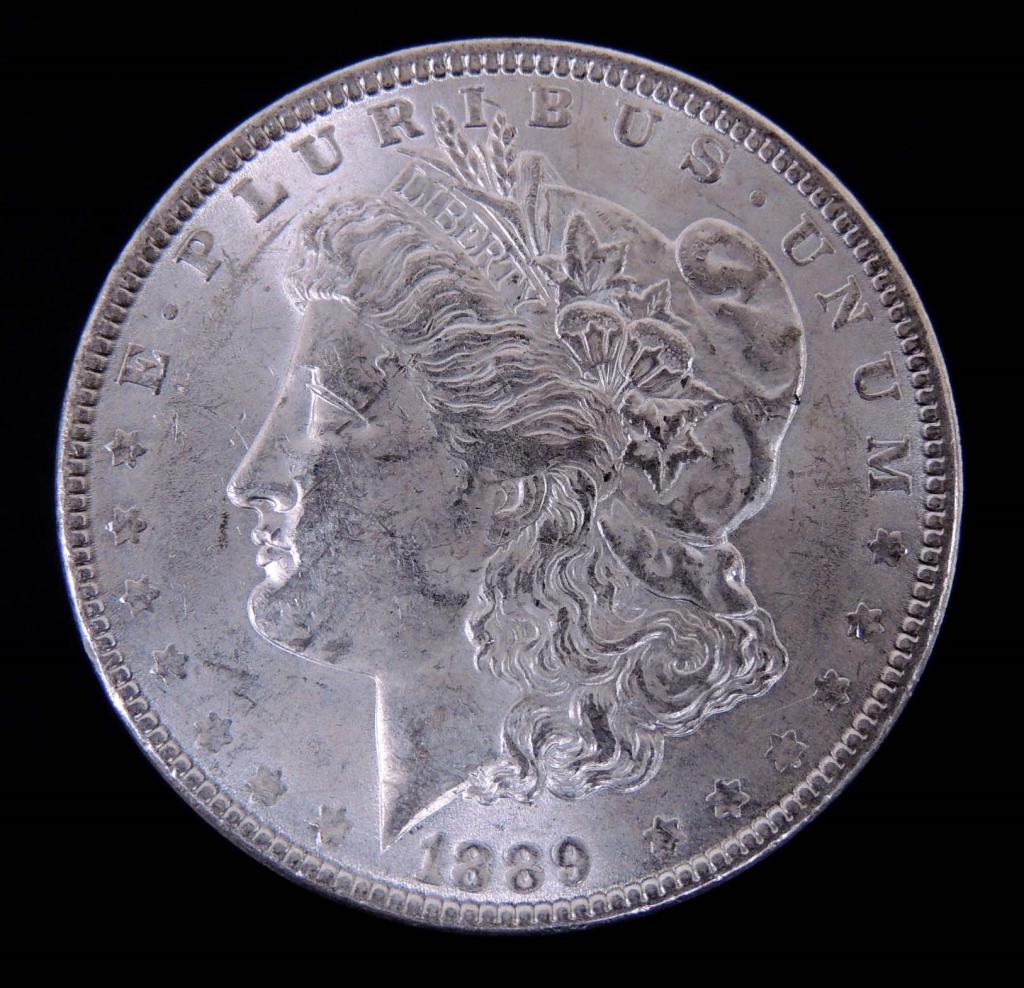1889 Morgan silver dollar: 1889 Morgan silver dollar (Philadelphia Mint). 90% silver.