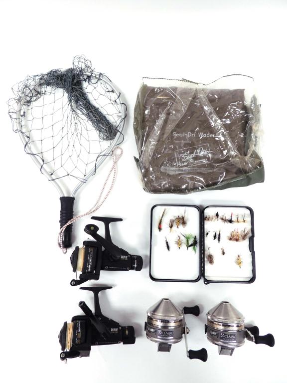 Fishing Lot: 4 Reels & 27 Lures: 27 Lures. Large Seal-Dri Wader. 4 Reels: Two Zebco CR10 & Two Zebco 33 Classic Reels, Small net.