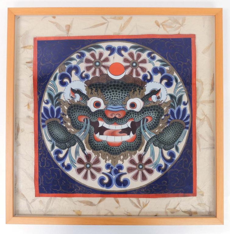 Thangka of a Dragon - Framed: From Thimpu, Bhutan. Features the sun / moon symbol on the dragon's head. Represents wisdom / method and eternal life. Flowers surrounding the dragon may be lotus blossoms, relating to the Buddhist ta