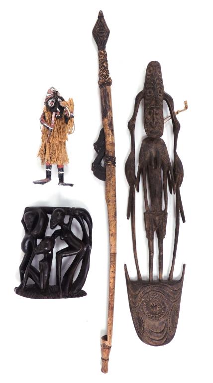2 Carved wood figures, Spear & Small woven doll: 4 Pieces - Spear has removable tip, 35". Hardwood carving of three figures 7" L x 9" H. Carved figure of a woman, likely New Guinea, repaired. 5.5 x 27". Doll - 10"
