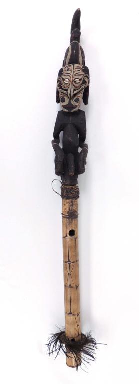 New Guinea Carved Staff: Male figure and bird carved set into painted and adorned bamboo. Lime pot style, but probably not a lime pot. 38.5" total length.