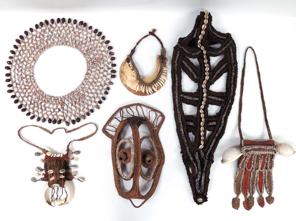Tribal Wearable art collection: 1 - Shell & tooth necklace. 2 - Woven Bead wide neck adornment. 3 - Woven ornamental fabric with 2 large and many small shells. 4 - Light weight woven mask.