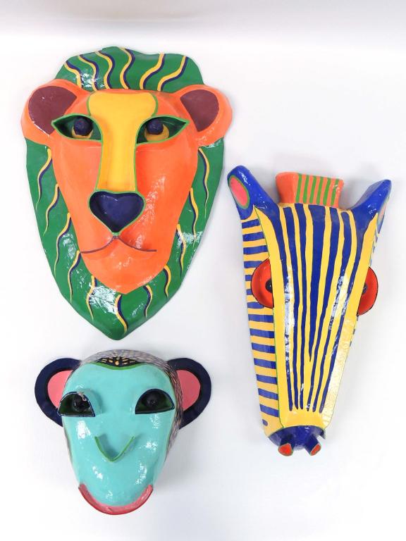 Gina Truex - Papier Mache Masks: Giraffe (10 x 16"); Green Monkey (10 x 8") (damage to right eye); Lion (10.5 x 17.5 "). Gina Truex, Gina's Collection.