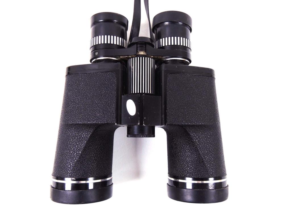 Bell & Howell Zoom Binoculars: 8 - 17 x 48, 210 Feet at 1000 yards at 8x. Ultra violet fully coated lenses. Both eyecaps included. (no case).