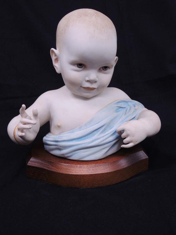 Cybis Porcelain Baby Bust, Signed blue blanket: 1967, #73 of 500. 11" high on wood base.