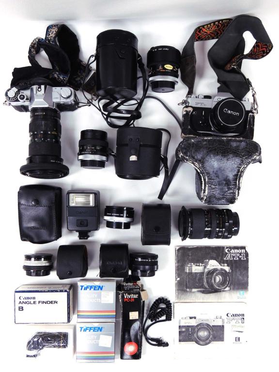 Canon AT-1 & FTb Cameras, 5 Lenses & gear: Canon AT-1 Camera. Canon FTb Camera. Canon 50mm 1:1.4 Lens. Canon 50mm 1:3.5 S.S.C. macro lens (with case). Canon 35-105mm 1;3.5 zoom lens FD. Access 35-70mm 1:2.5-3.5 Macro Zoom Lens (for Canon). Viv