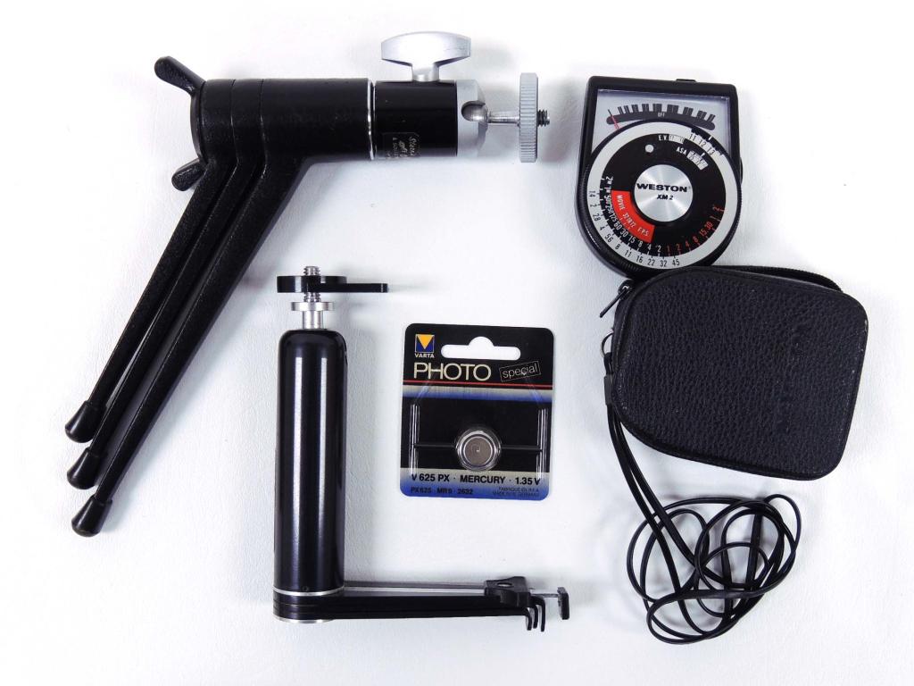 Leitz Table Top Tripod for cameras, TravlPod...: Leitz-Wetzlar, Germany. Ball mount. Very good condition Likely rarely used. Trav-l-pod lightweight tabletop tripod by W. N. Geiger Industries. Weston XM2 Light Meter