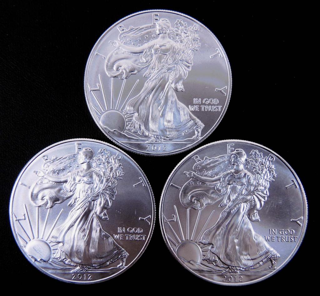 Three (3)  2012 BU Silver Eagle Coins (1 of 2)
