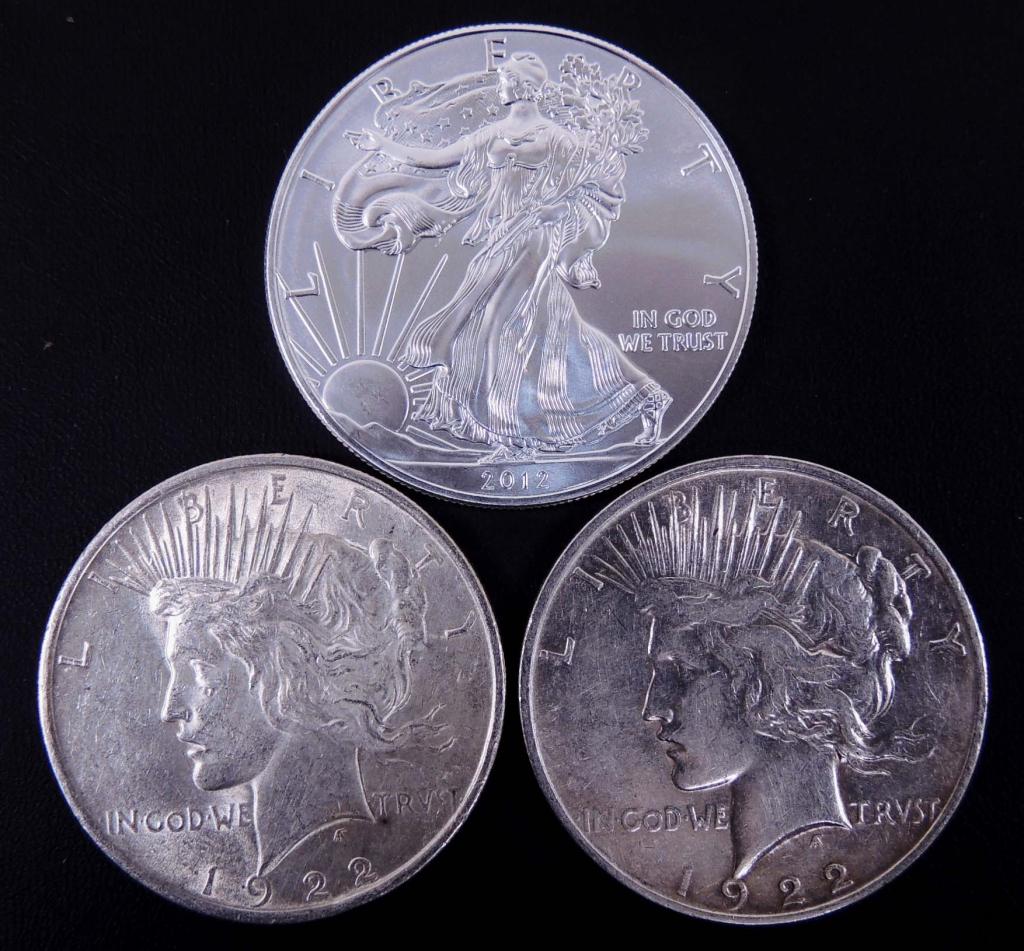 (2) Peace Dollars and (1) Silver Eagle (1 of 2)
