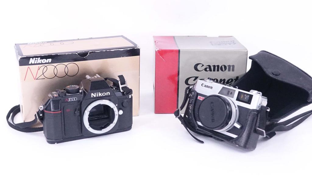 Camera Lot: Nikon N2000 35mm body only, in box. Canon Canonet QL 17 - camera in very good condition, case is rough.