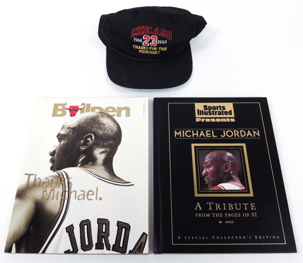 Bulls Program & Hat, Michael Jordan Tribute Nite: Chicago Bulls Program and hat given out at 1993 Michael Jordan tribute game. Also includes Sports Illustrated Tribute Book, signed by the author. A couple of pieces of real Jordanania!