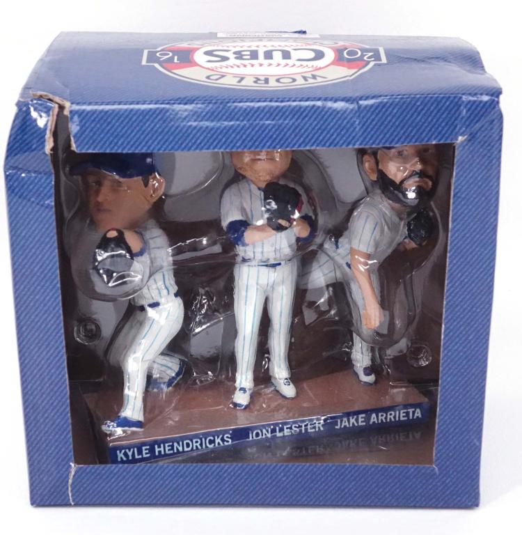 Cubs 2016 World Series Triple Bobblehead: 2016 World Series triple bobblehead (Hendricks, Lester, Arrieta). Box never opened. Box says sponsored by Las Vegas tourism, so we think this may have been a stadium give-away (SGA).