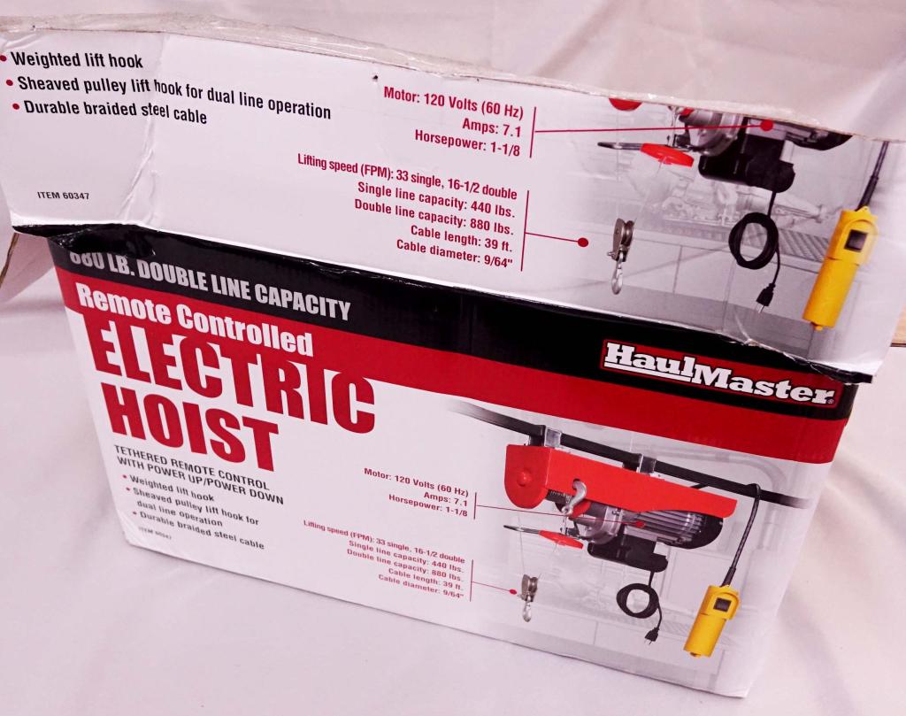 Haul Master Remote Electric Hoist: *****3rd party shipping or local pickup only. We can NOT ship this item from our shop*****. Haul Master remote controlled electric hoist, in original box. Model 60347. 800 lb limit.