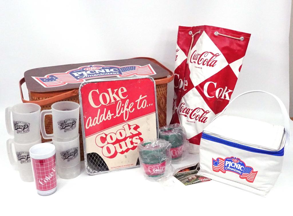 Coca-Cola Branded Picnic Supplies: Dr. Pepper picnic basket and vintage Coca-Cola one-match minigrill; 4 Bargs plastic tall mugs, 2 sleeves, disposable cups, tumbler. Mini-table inside basket/ Basket: 20 x 11.75 x 11. Grill: 10.25 x 12