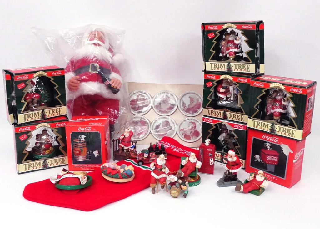 Coca-Cola Christmas Lot: 11+ ornaments, Santa doll (16") (new), coaster set (new/sealed).