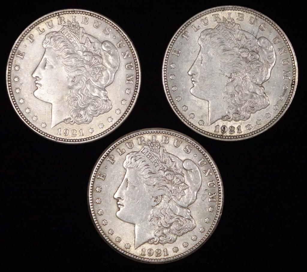 Morgan Silver Dollars (3): 3 Morgan silver dollars: 1921 - Philadelphia mint (x2), 1921-s (faint "s" mint mark). Anticipated sale time for this lot: 5:02 pm, CST.