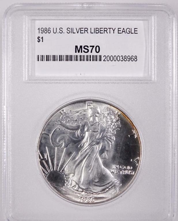 1986 Silver Eagle (PCC Slabbed): 1986 United States $1 Silver Eagle bullion coin. Slabbed by Premier Certified Coins, and labeled as MS70. 1 troy ounce of 0.999 fine silver.