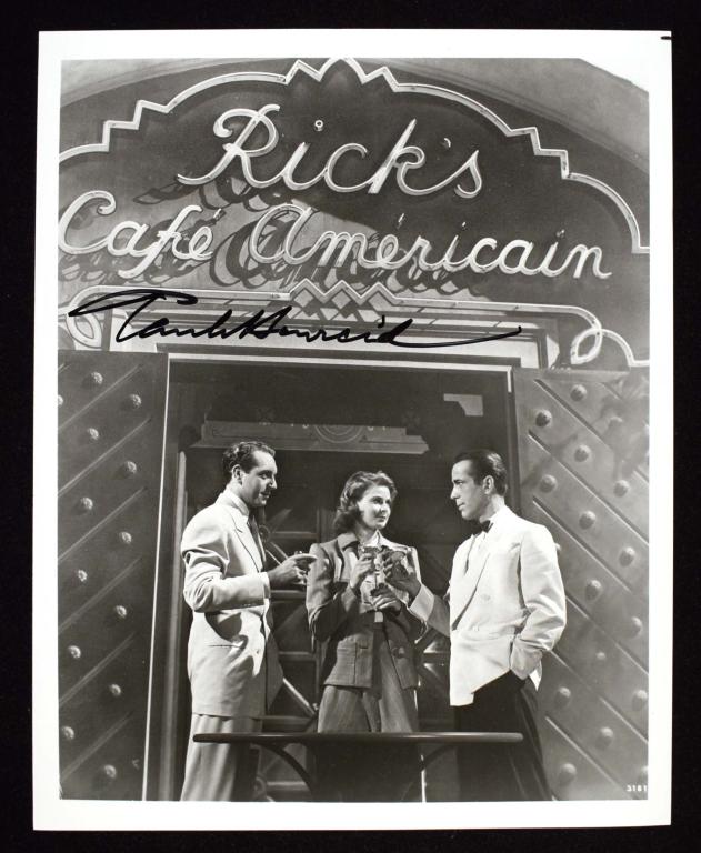 Autograph: Paul Henreid (Casablanca): 8x10" black and white photo signed by actor Paul Henreid. Henreid played Victor Lazlo in the iconic "Casablanca", and this picture shows him sharing drinks with Humphrey Bogart and Ingrid Bergman in f