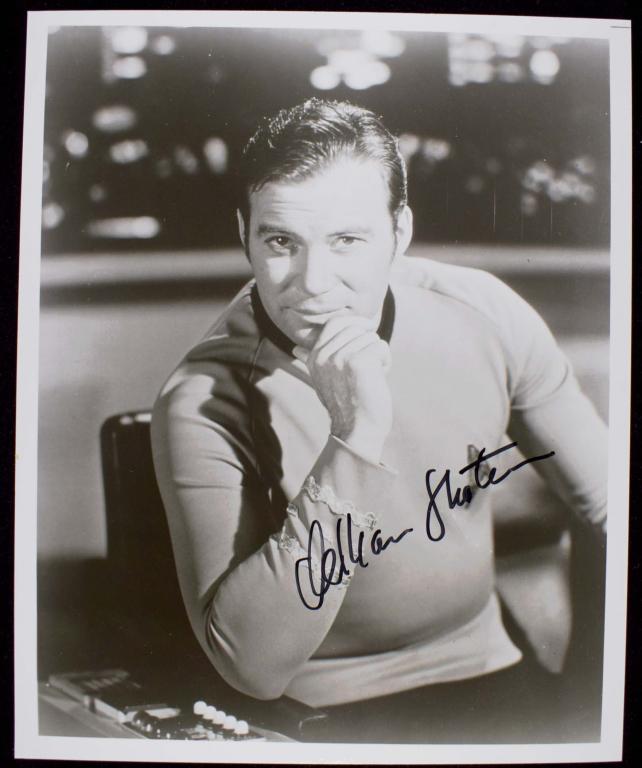 Autograph: William Shatner (Star Trek): An 8x10" black and white signed photo of actor William Shatner, in his iconic role as Captain James T. Kirk in the original 1960's TV series "Star Trek". We have a similar Leonard Nimoy signed piece c