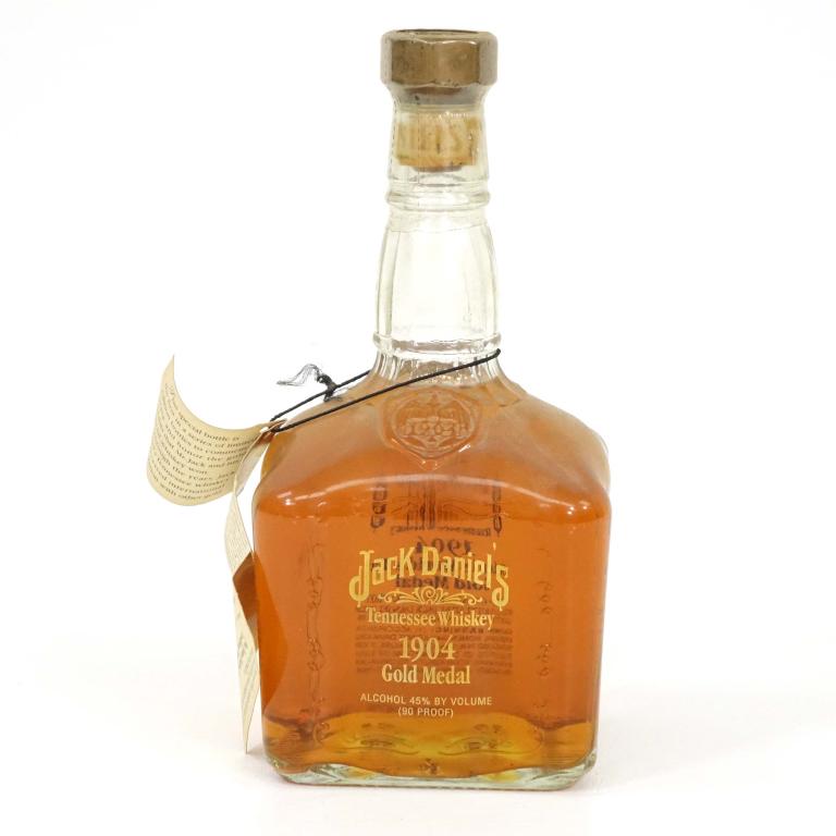 Bottle: Jack Daniels 1904 Gold Medal Whiskey: St. Louis. Sealed, 750 mL, 90 proof, original tag.