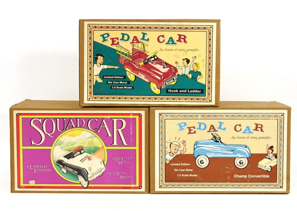 3 Vintage-Die-Cast-Limited Edition Cars: 1 Limited Edition Champ Convertible Pedal Car, 1993. 1:3 scale; 1 Limited Edition Fire Dept (With hook and ladder) Pedal Car, 1992. 1:3 scale; 1 Limited Edition Squad Car, 1993. 1:3 scale.