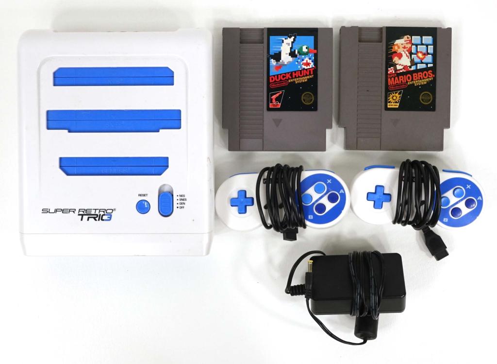 Super Retro Trio 3: (Play, NES, SNES, Genesis). 2 controllers (1 insulation frayed) and adapter, plus NES Duck Hunt and Super Mario Bros.
