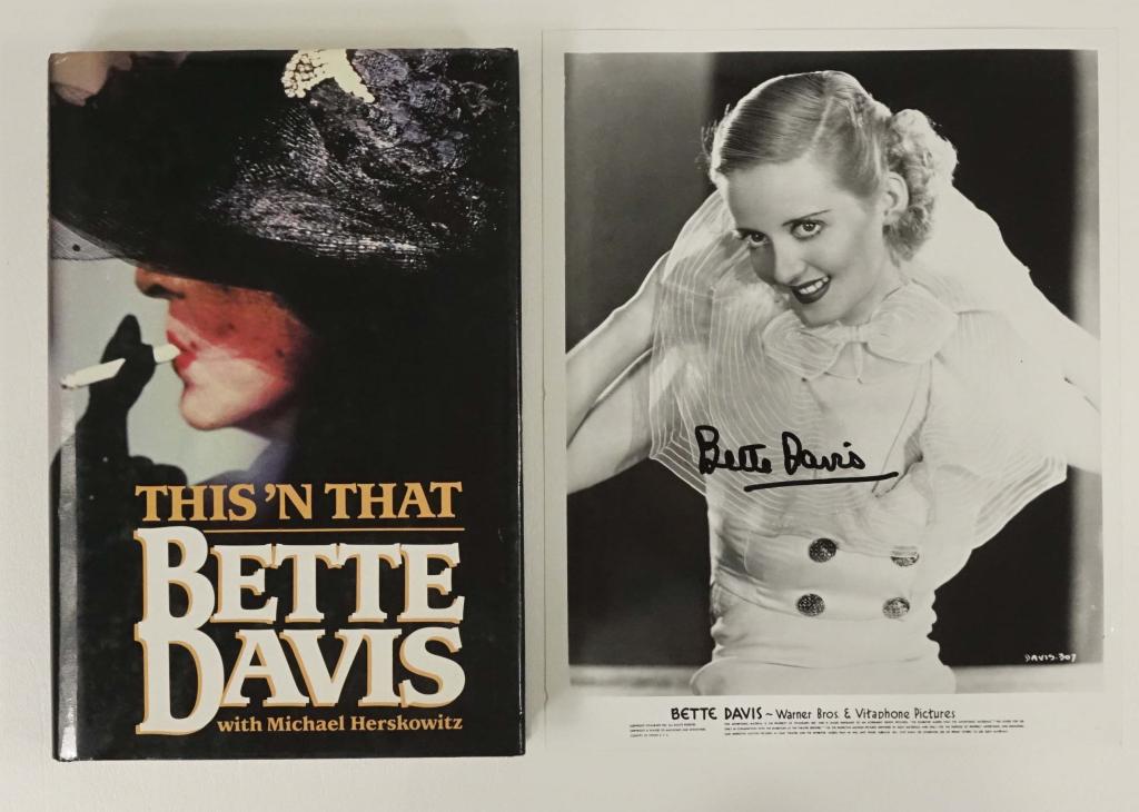 Autograph Lot: Bette Davis: Autographed b&w photograph, vintage, 8x10". Book, "This 'N That" 1980. ** Lot 14 makes the following guarantee: If either Professional Sports Authenticator (PSA) or Beckett Global, or James Spence Aut