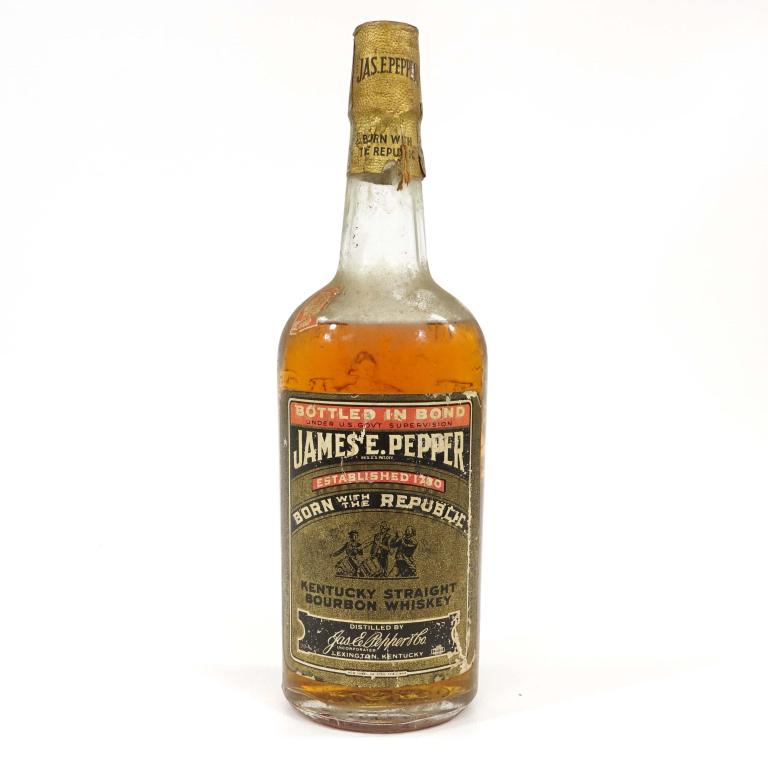 Bottle: 1944 James E. Pepper Bourbon Whiskey: *** If shipping is needed, please call Ian at Lot 14 BEFORE bidding *** Bottled in Bond. 4/5 Quart. 100 Proof, Distillery #5, 1939. Bottled at #43, date not readable, likely 1944. With cord under seal