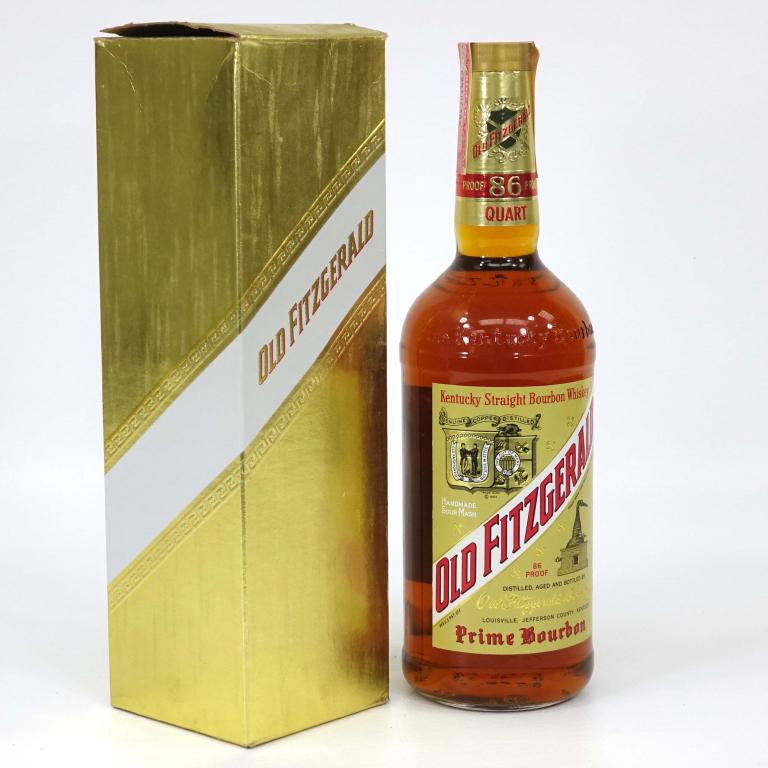 Bottle: Old Fitzgerald Bourbon Whisky: *** If shipping is needed, please call Ian at Lot 14 BEFORE bidding *** 86 proof, very good fill. 1974(?). Gold box. If you may need shipping on bottles, you MUST talk to Ian before bidding.