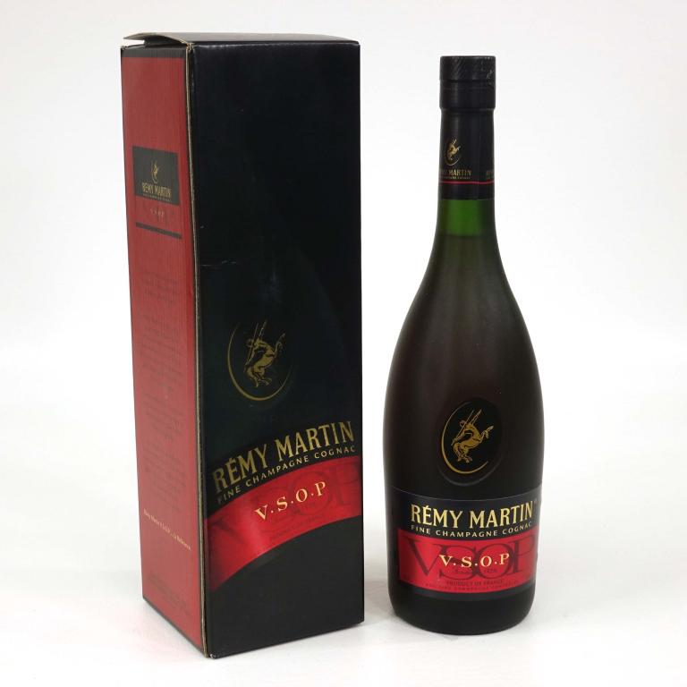 Bottle: Cognac Remy Martin VSOP: *** If shipping is needed, please call Ian at Lot 14 BEFORE bidding *** In box. 750 ml. If you may need shipping on bottles, you MUST talk to Ian before bidding.
