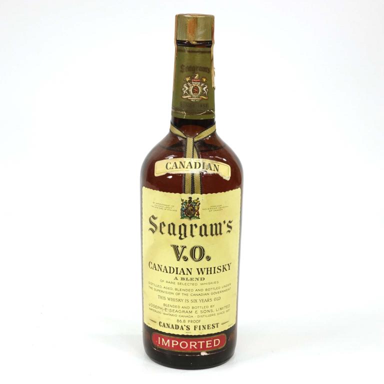 Bottle: 1963 Seagram's VO: *** If shipping is needed, please call Ian at Lot 14 BEFORE bidding *** 1963 Seagram's VO. If you may need shipping on bottles, you MUST talk to Ian before bidding.