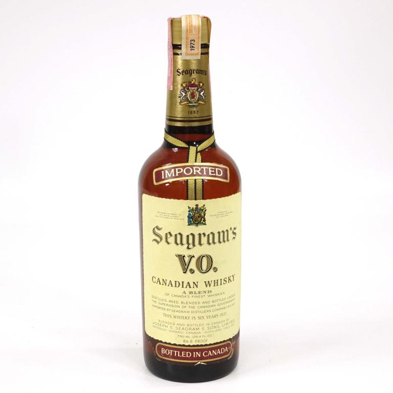 Bottle: 1973 Seagram's VO: *** If shipping is needed, please call Ian at Lot 14 BEFORE bidding *** 86.8 proof. 750 mL. If you may need shipping on bottles, you MUST talk to Ian before bidding.