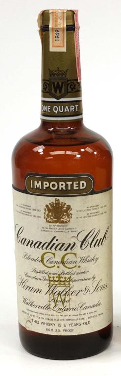 Bottle: 1969 Canadian Club, Quart: *** If shipping is needed, please call Ian at Lot 14 BEFORE bidding *** 1969 Canadian Club, Quart. If you may need shipping on bottles, you MUST talk to Ian before bidding.
