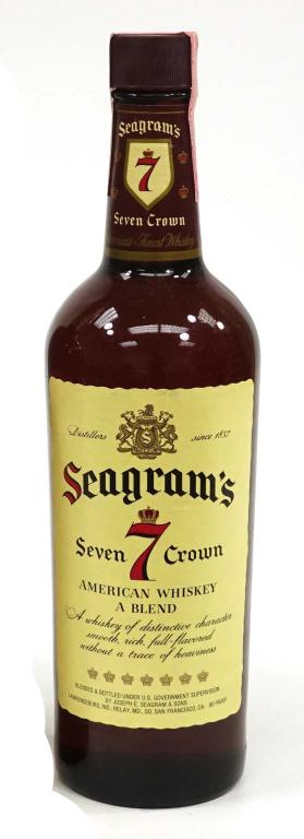 Bottle: Seagram's 7: *** If shipping is needed, please call Ian at Lot 14 BEFORE bidding *** 4/5 quart. If you may need shipping on bottles, you MUST talk to Ian before bidding.
