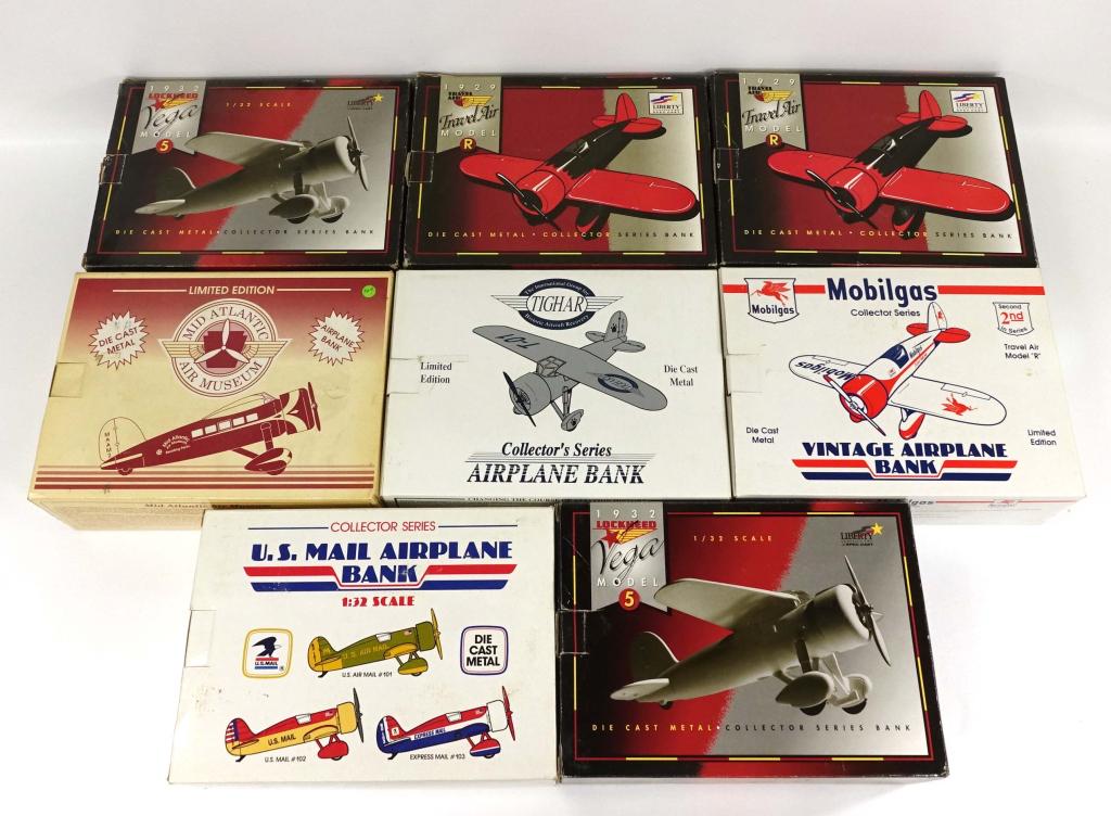 8 Die-Cast Airplane Banks: Including Eastwood Automobilia, Mobilgas, US Mail, and Travel Air. *One box indicates 1:32 scale, so all 8 planes are most likely 1:32 since approx. same size.